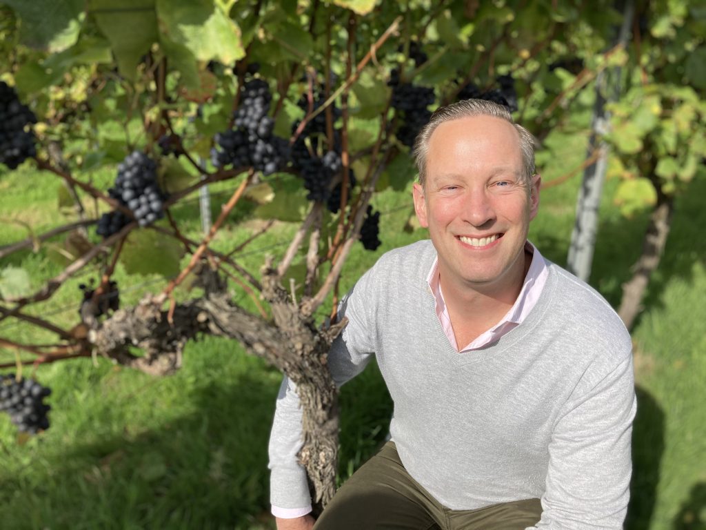 Digby CEO Trevor Clough with Pinot Noir vines