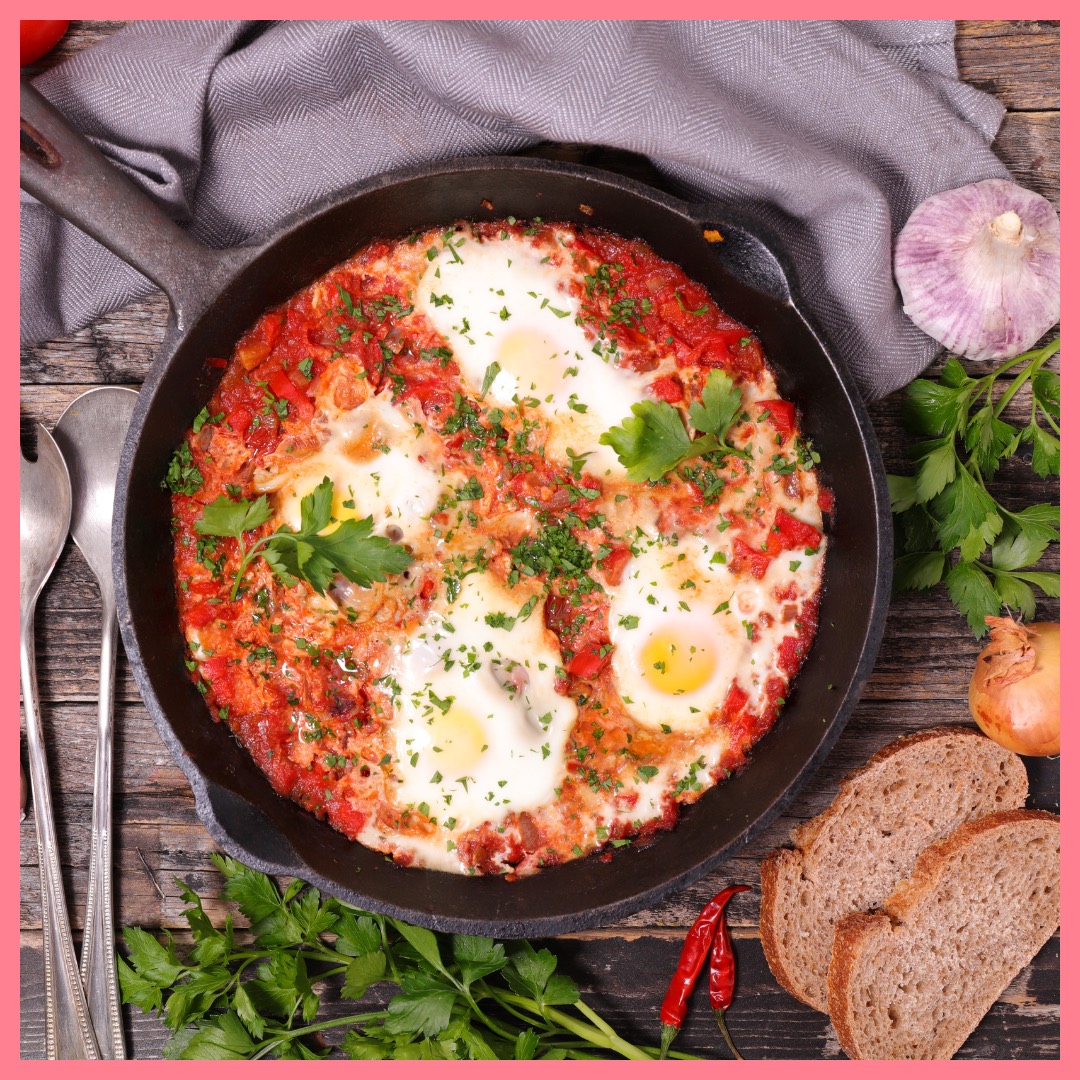 Shakshuka - baked eggs in tomato sauce, served with bread